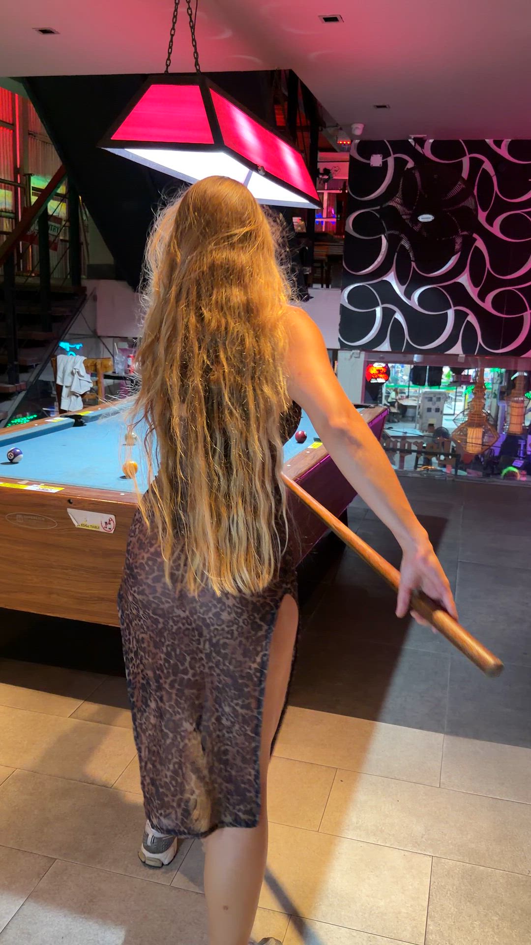The sheer dress hugged every curve before I leaned over the table